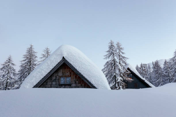 istock Winter landscape with small wooden house 914280962