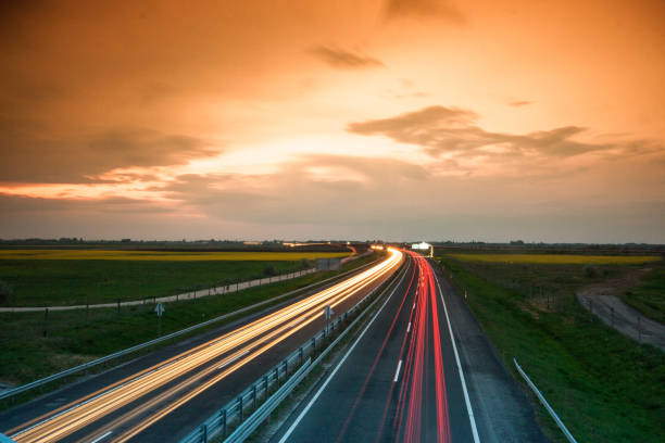 istock Cars speeding on a highway 914290814