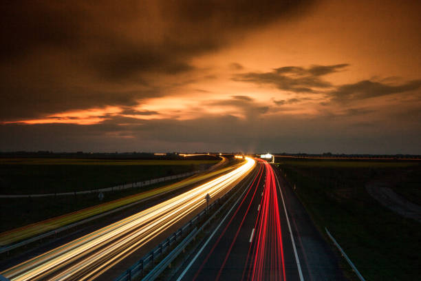 istock Cars speeding on a highway 914300340