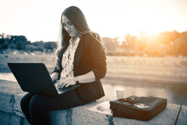 istock Young woman with laptop 914301288