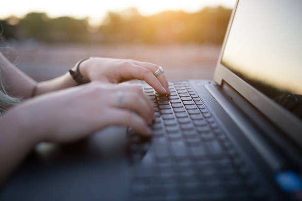 istock Closeup woman's hands typing on a laptop 914306684
