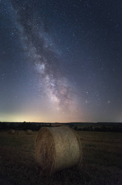 istock Summer starry night in the field 914307526