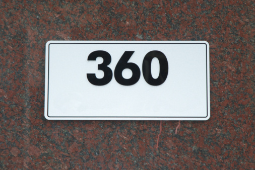 House number 80 on a marble wall