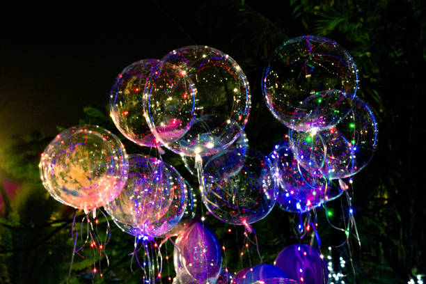 istock big beautiful gel balloons, painted lights and light bulbs. at night 914313894