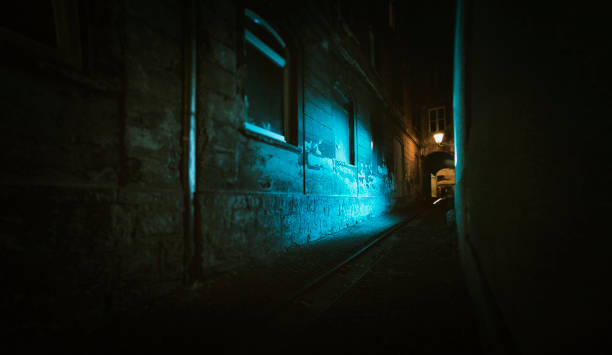 istock Spooky old narrow street passage 914315952