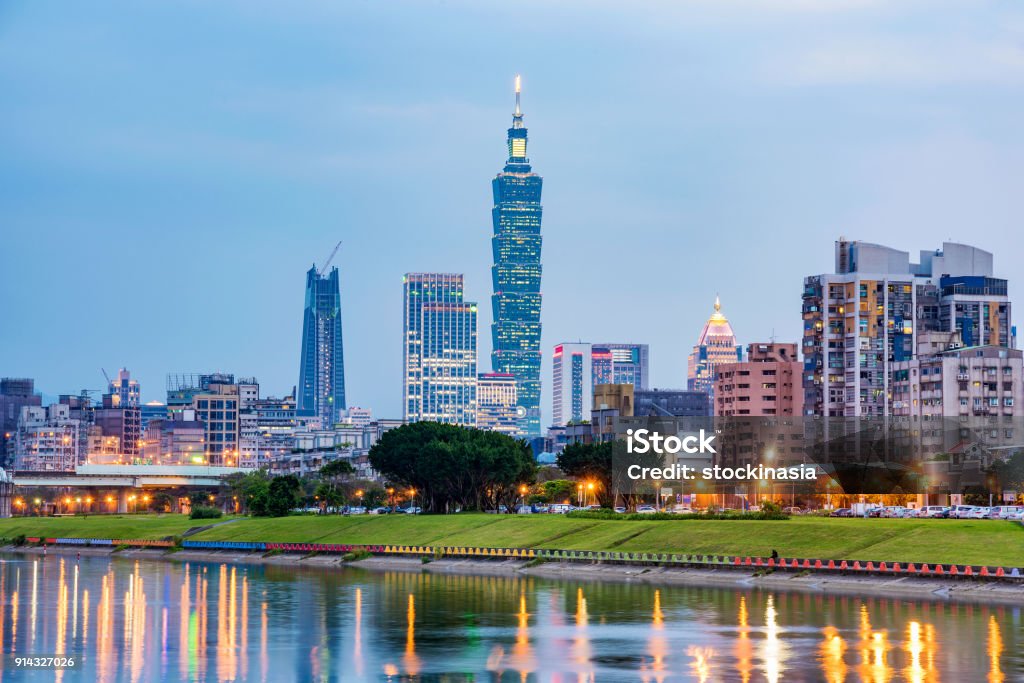 Evening cityscape of Taipei Cityscape of downtown Taipei and riverisde River Stock Photo