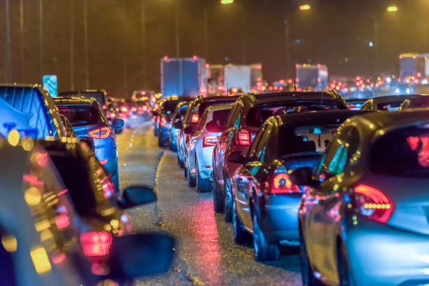 night view busy uk motorway traffic jam at night - night traffic imagens e fotografias de stock