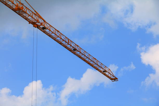 istock Tower crane industry, Construction buildings in site on sky background 914330474