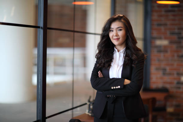 istock Young Asian businesswoman looking away 914330574