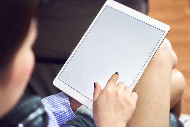 istock Woman using blank screen tablet. Blank screen for the graphics. Concepts for Digital Technology in Everyday Life. 914333572