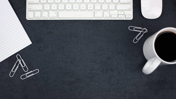 istock Business Desk with Dark Texture Background 914340190