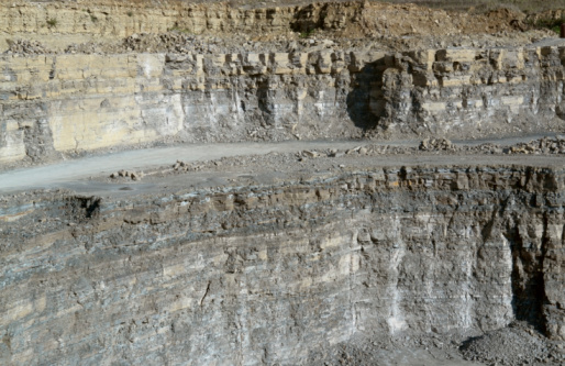 stone pit wall detail with tracks