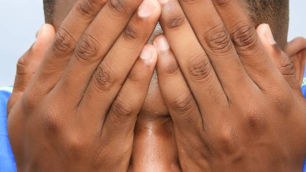 istock Shameful Unshaven Black Person 914346120