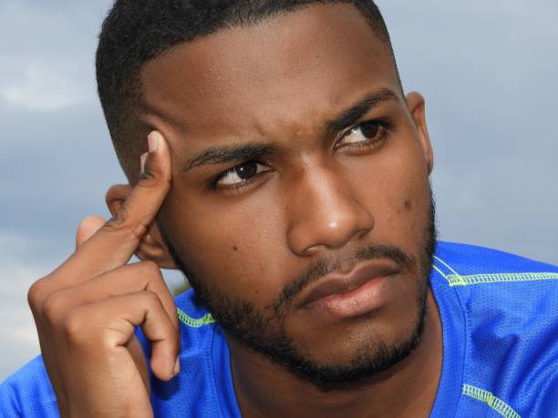 istock Unshaven Black Male Thinking 914346136