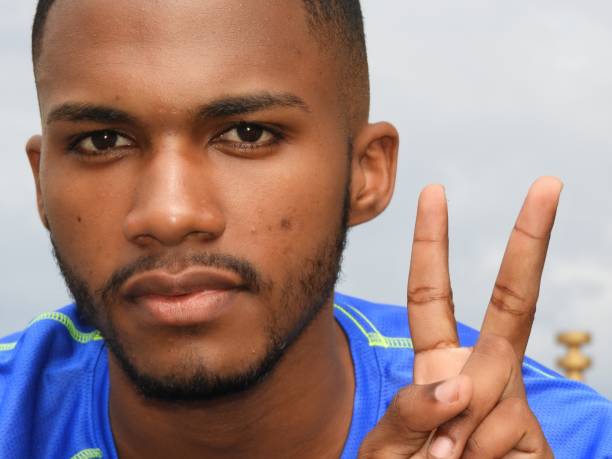 istock African Male And Peace Sign 914346148