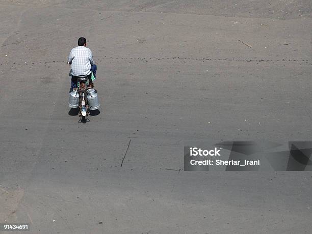 The Cycling Milkman Stock Photo - Download Image Now - Adult, Adults Only, Color Image