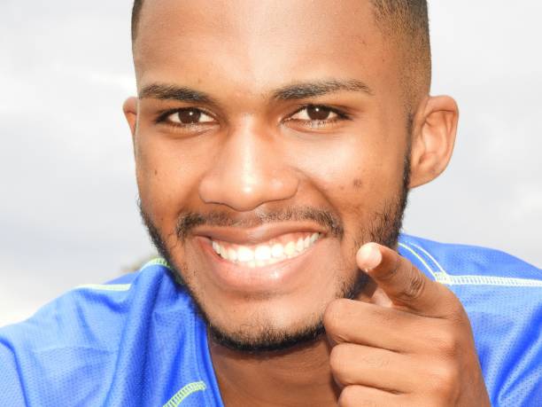 Unshaven Black Male Pointing