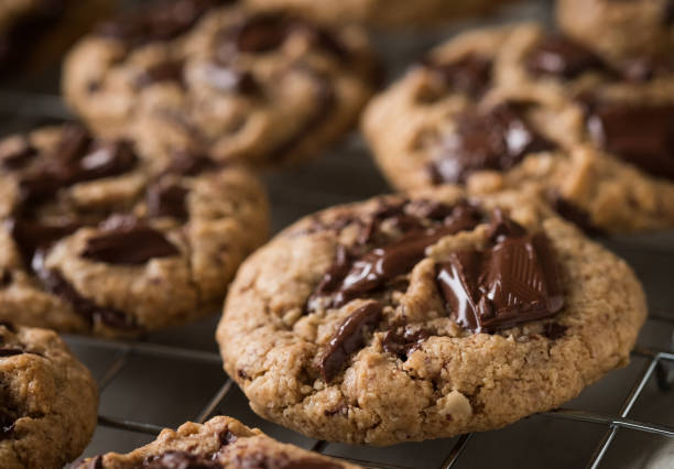 istock Freshly Baked Warm, Vegan Chocolate Chip Cookies on Cooling Rack 914358008