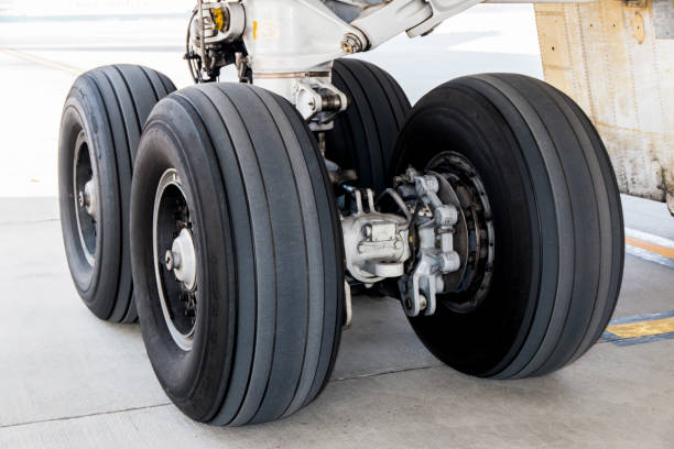 istock Close up of airplane wheels on runway 914365074