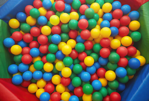 Group of many multicolored plastic balls. Close-up view stock photo