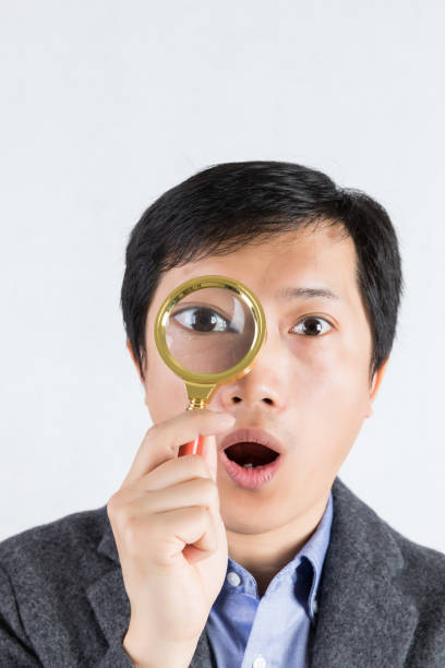 istock A man Find something that surprised him with a magnifying glass 914378874