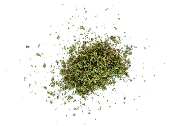 istock Crushed buds of marijuana, weed cannabis isolated on white background 914385196