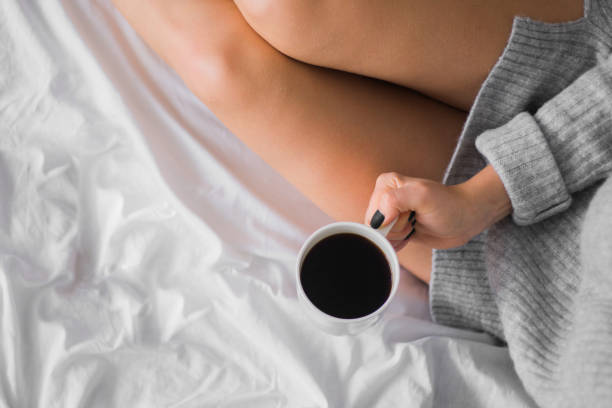 istock cup of coffee in bed copy space top view 914385670