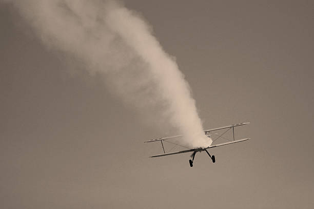 istock biplane with smoke Stearman Kaydet airplane 91438698