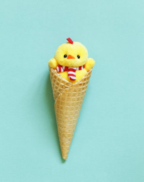 istock ice cream waffle horn with Easter decoration 914389216