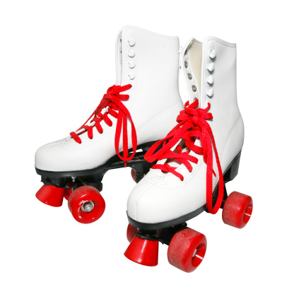 White old fashioned rollerskates dating back to the early seventies late sixties