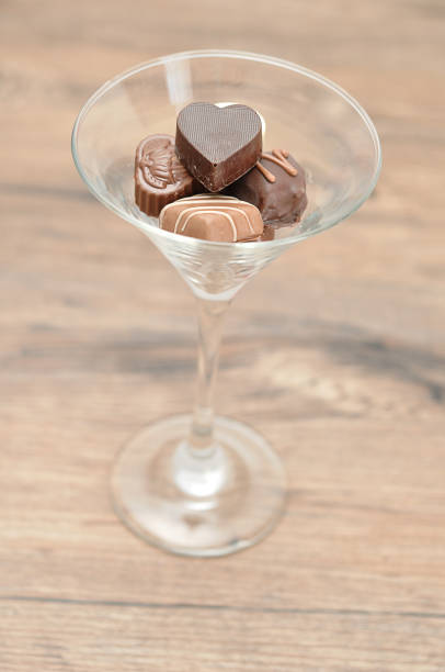 istock A variety of small chocolates displayed in a martini glass 914390150