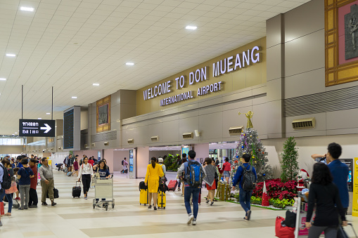 Visitors walking around Arrival Hall in Don Mueang International Airport, Terminal 2 is The Airport for budget airlines in Thailand using for both Domestic and International