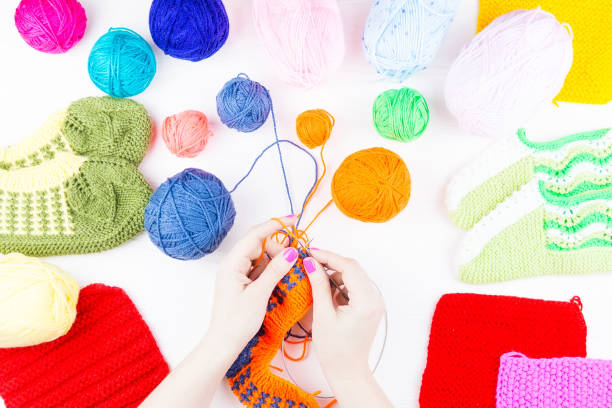 istock girl knits sock knitting needles 914392734