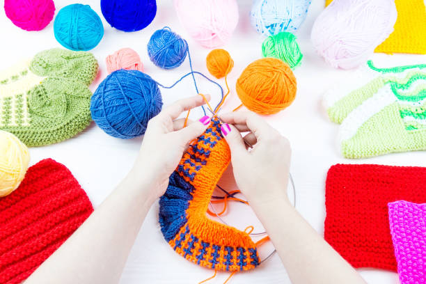 istock girl knits sock knitting needles 914392756