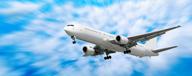 istock XXL jet airplane landing in motion blur sky 91439469