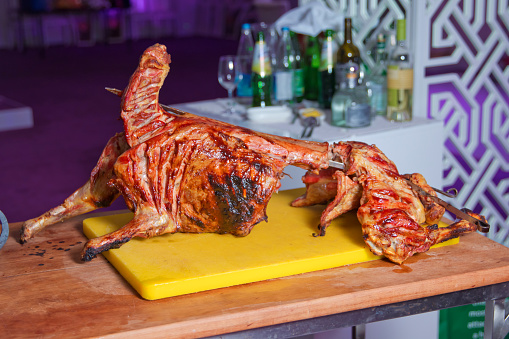 Roasted meat over an open fire, cooked in a special way.Barbecue is prepared of lamb or sheep meat and processed by slasher.