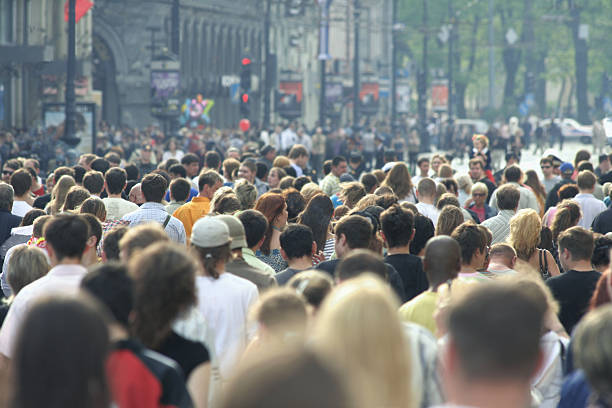 istock Rear view crowd in urban area during warm weather 91439881