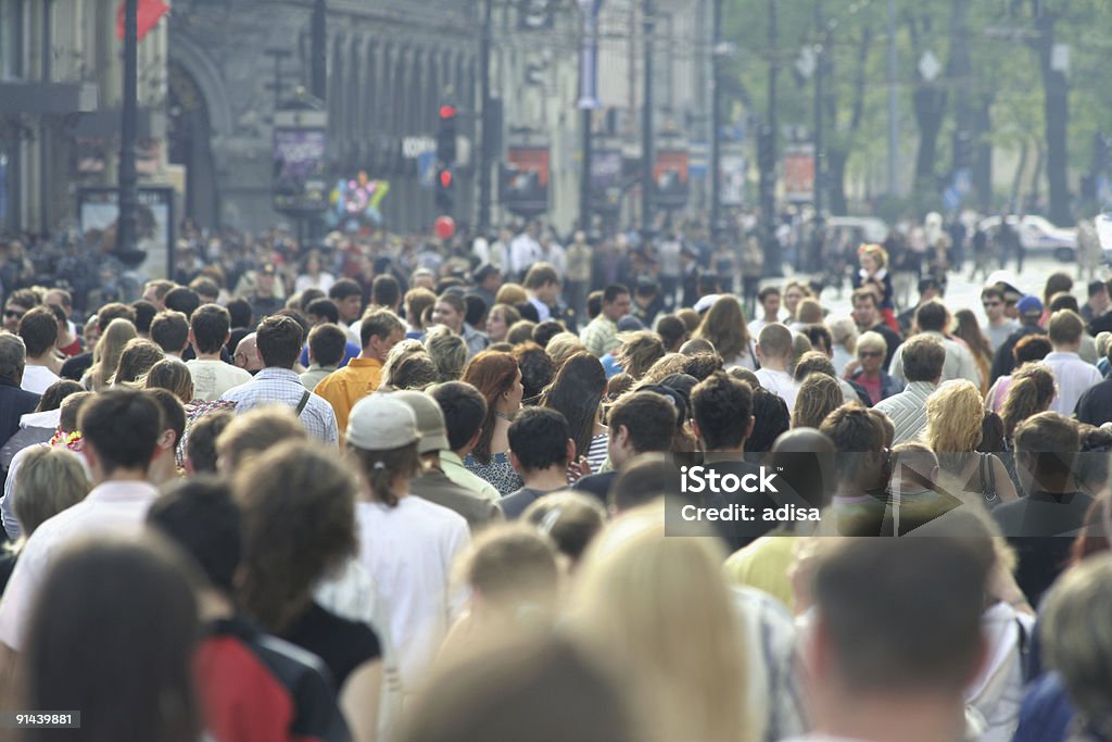 Rear view crowd in urban area during warm weather  Street Stock Photo