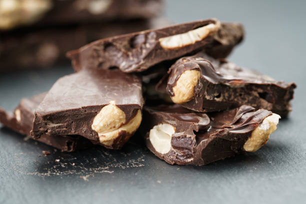 istock broken homemade bar of chocolate with cashew nuts reverse side 914411510