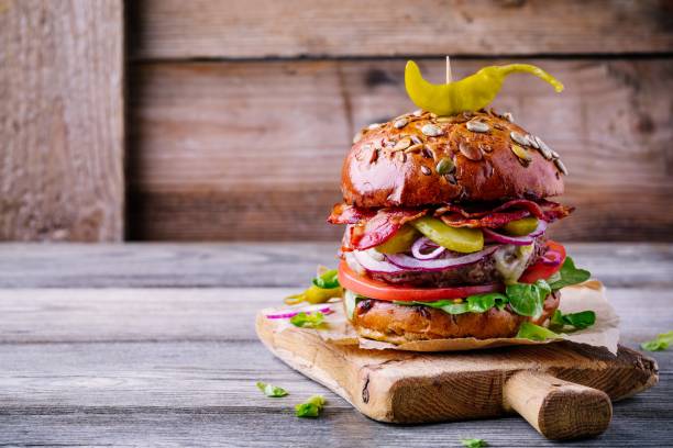 istock homemade burger with whole grain bun and fried bacon 914422750