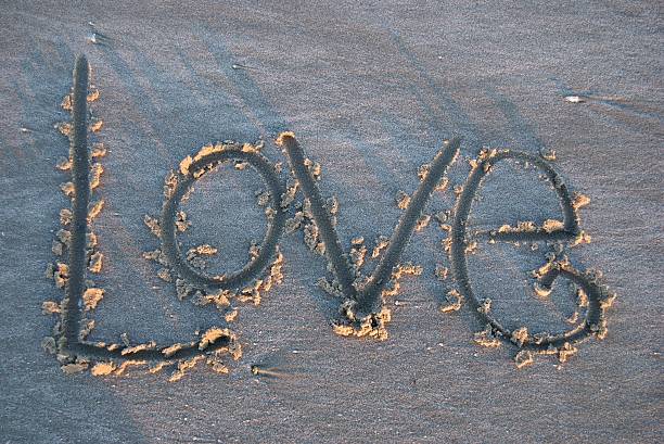 istock Love written in the sand. 91442546