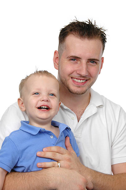 Padre e figlio sorridente - foto stock