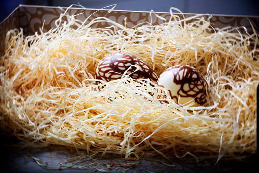 Homemake Easter eggs ready to hatch in a basket