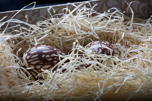 Homemake Easter eggs in a straw nest