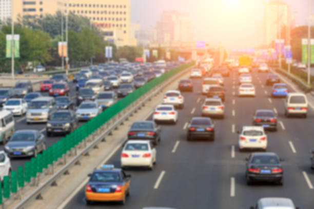 istock blurred car driving on crowded city road in Beijing 914435426