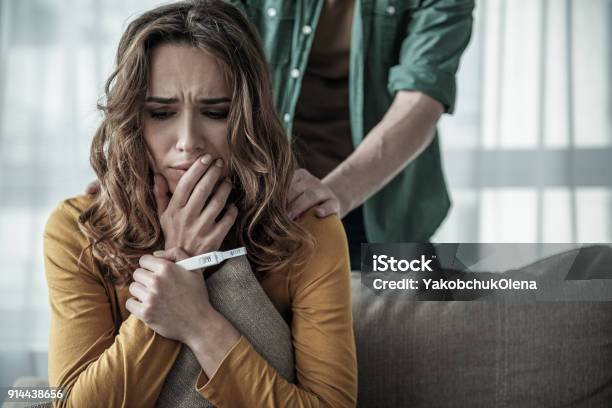 Couple Deciding To Abort Female Pregnancy Stock Photo - Download Image Now - Pregnant, Abortion, Fear