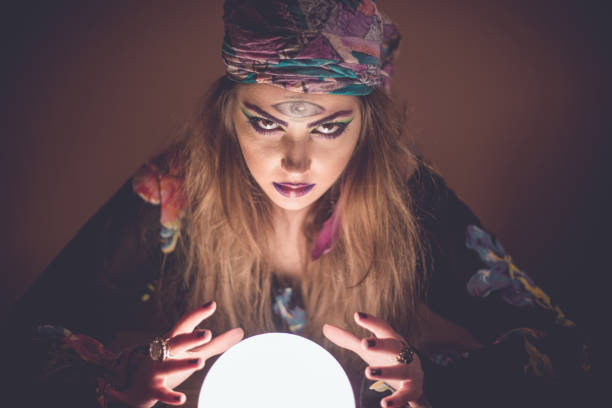 istock Girl with crystal magic ball 914438702