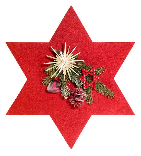 frontal shot of some christmas decoration with red felt star, isolated on white with clipping path