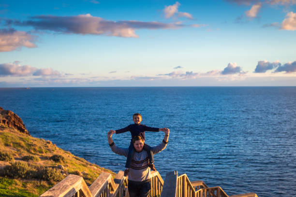 istock Father giving his son piggyback ride 914451094