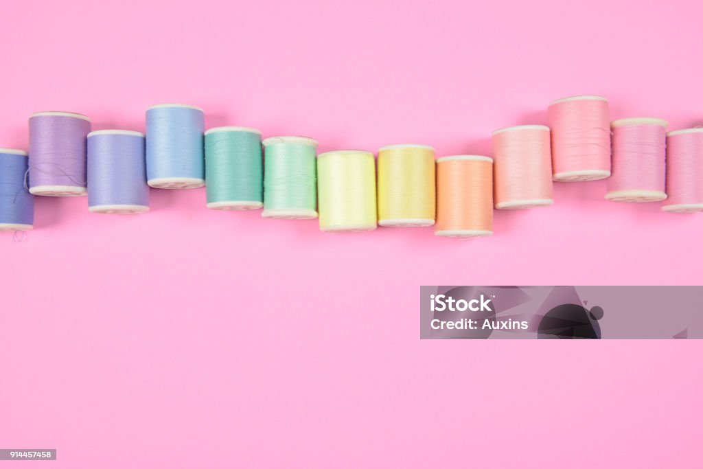 Colorful Thread Rolls Flat Lay Of Colored Thread Rolls For Sewing On Pink Background Sewing ...